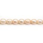 Salmon color oval freshwater pearls on thread 7-10mm x 40cm