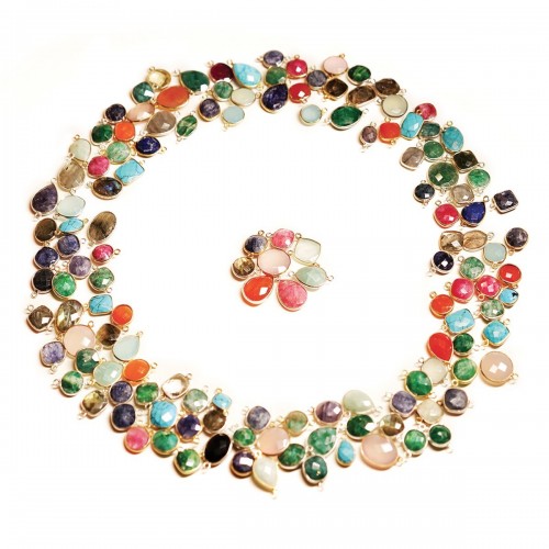 Faceted oval traited blue gemstone set in silver with zirconium  13x17mm x 1pc