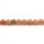 Orange sun stone, in round faceted flat shape, 4.5mm x 39cm