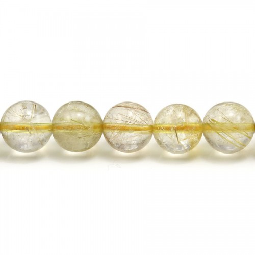 Quartz rutile, de forme ronde et de taille 10 - 11mm x 40cm