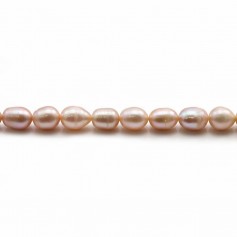 Perles d'eau douce ovales rosé sur fil 6-7mm x 40cm