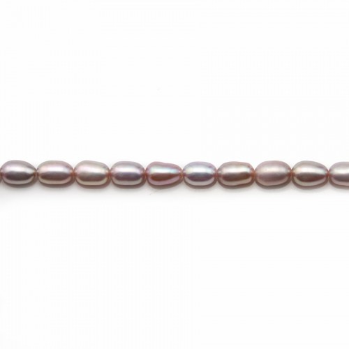 Mauve oval freshwater cultured pearls on thread 4-5mm x 36cm