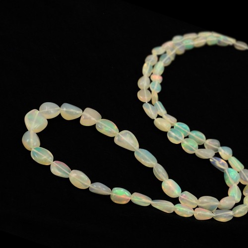 Ethiopian oval baroque opal 5x7 - 8x12mm x 50cm
