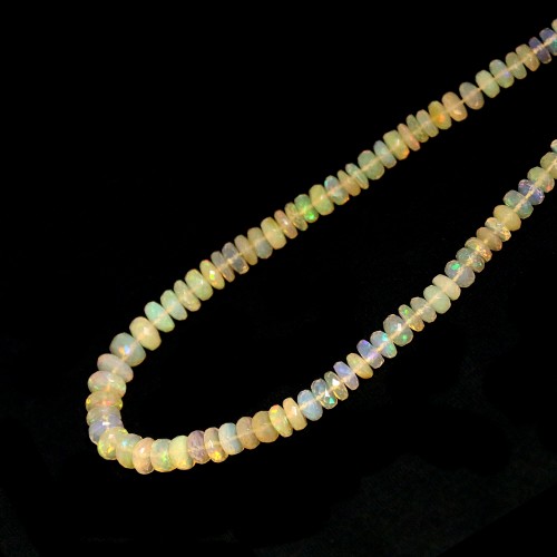 Äthiopischer Opal facettierter Rundstab mit Stufenschliff 4-8mm