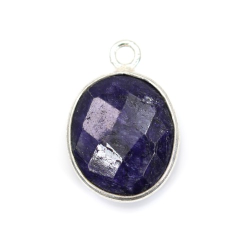 Oval faceted treated blue gemstone set in silver 11x13mm x 1pc