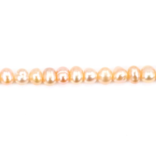 Salmon color oval freshwater cultured pearls on thread 4mm x 40cm