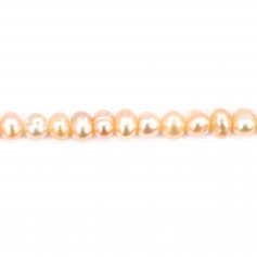 Salmon color oval freshwater pearls on thread 4mm x 40cm