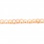 Perles d'eau douce ovales couleur saumon sur fil 4mm x 40cm