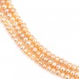 Salmon color oval freshwater pearls on thread 4mm x 40cm