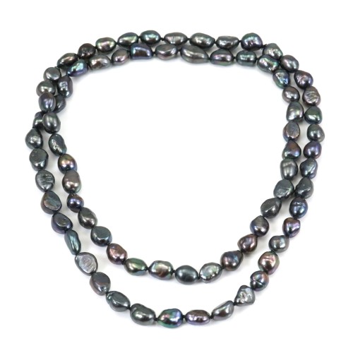 Long necklace in oval dark blue fresh water pearl, measuring 8 * 10mm x 1pc