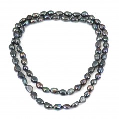 Sautoir en perles d'eau douce bleu foncé de forme ovale, mesurant 8x10mm x 1pc
