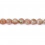 Rhodochrosite, de forme ronde plate aux extrémités, taille 2.8x3mm x 40cm