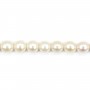 Perles d'eau douce blanc rosé ovales sur fil 6-7mm x 40cm
